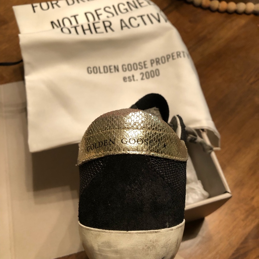 Designer Golden Goose Sneakers. Worn 5  or 6 times. All original packaging